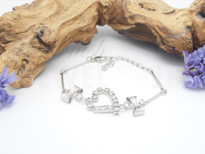 Silver Plated Diamante Heart Bracelet With Bows